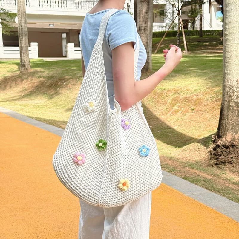 2026 cross-border beach bag shoulder tote bag for women hollow new Korean style knitted woven bag flower lazy style