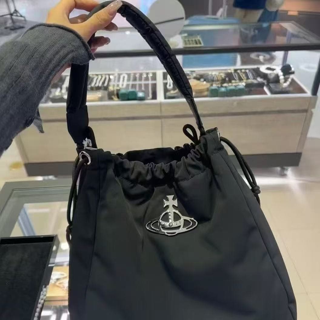 2025 new Westwood Saturn nylon drawstring bucket bag, minimalist shoulder underarm large capacity tote for women.