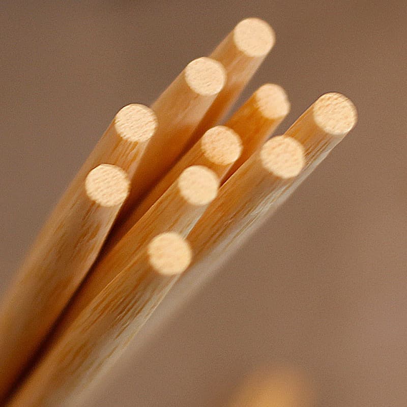 Premium disposable carbonized bamboo chopsticks for restaurants, home use with independent packaging, commercial set tableware.