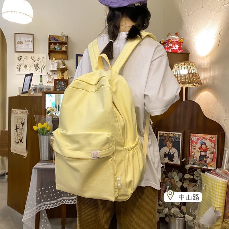ins Japanese girl schoolbag female Korean version junior high school student cute solid color backpack high school student large capacity backpack