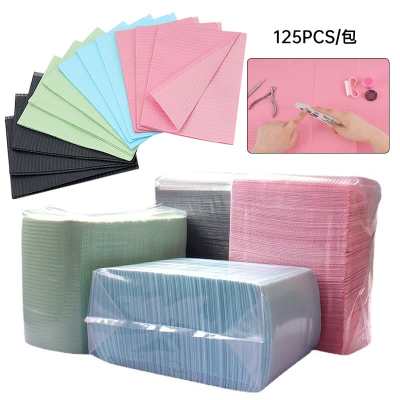Wholesale disposable nail art tattoo dental pad 125 pieces/pack of three-layer composite anti-penetration table pad eyelash tools