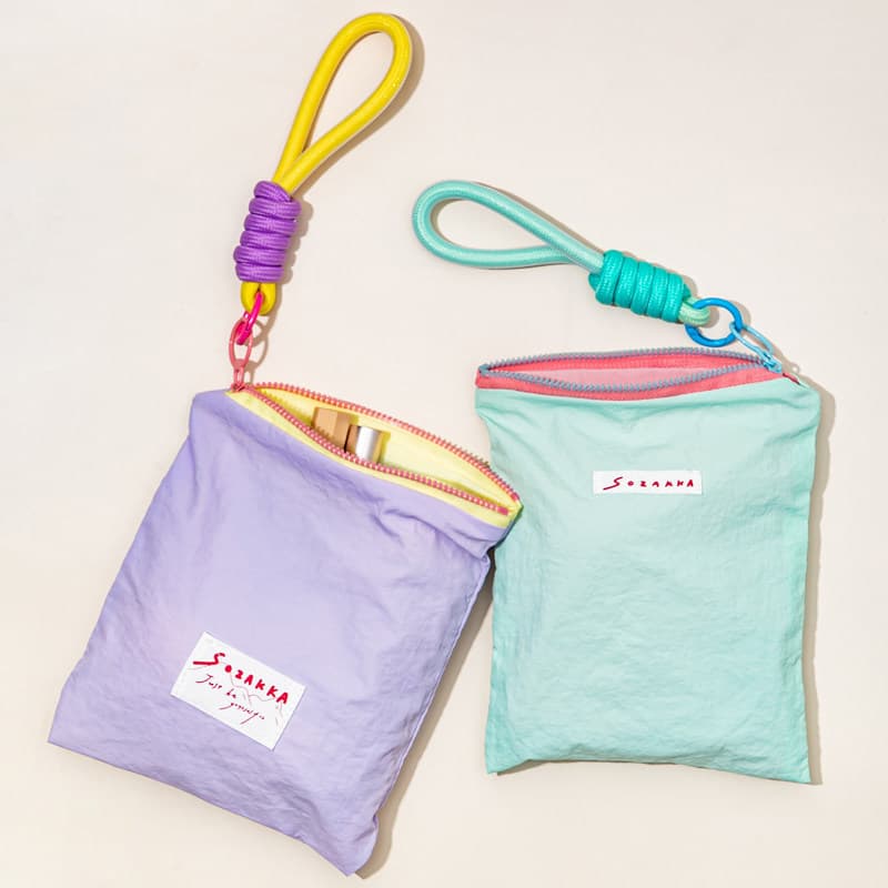 Portable cosmetic bag for going out, thin macarons, contrasting color lipstick, cosmetics storage bag, high-looking simple zipper bag