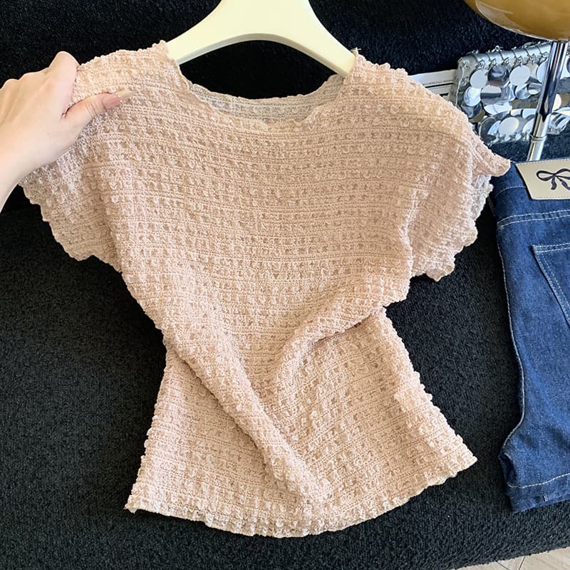 Actual photo of a chic and gentle pleated short-sleeve T-shirt for women, soft and textured, slim-fit and flattering, elegant top for summer