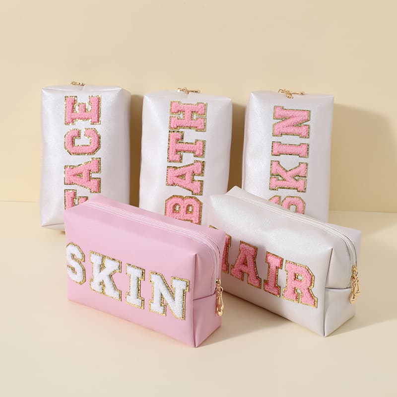 Cross-border Amazon best-selling cosmetic bag colorful chenille letter PU leather waterproof hand cosmetic bag storage bag