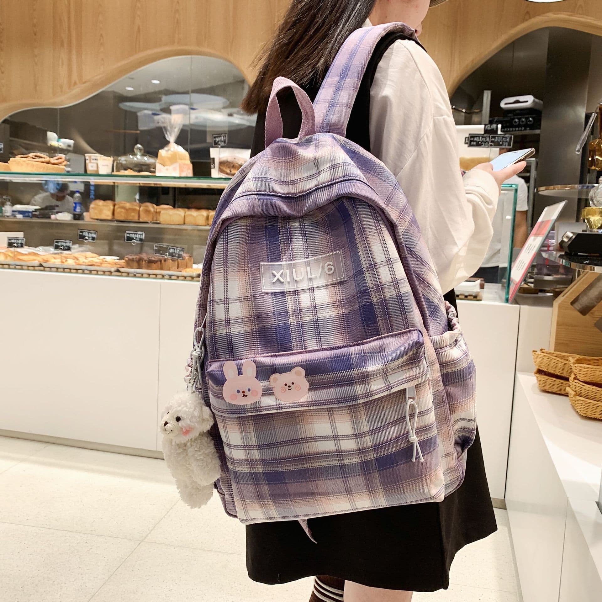 Autumn fresh and simple plaid schoolbag female Korean version junior high school college student backpack campus versatile casual backpack