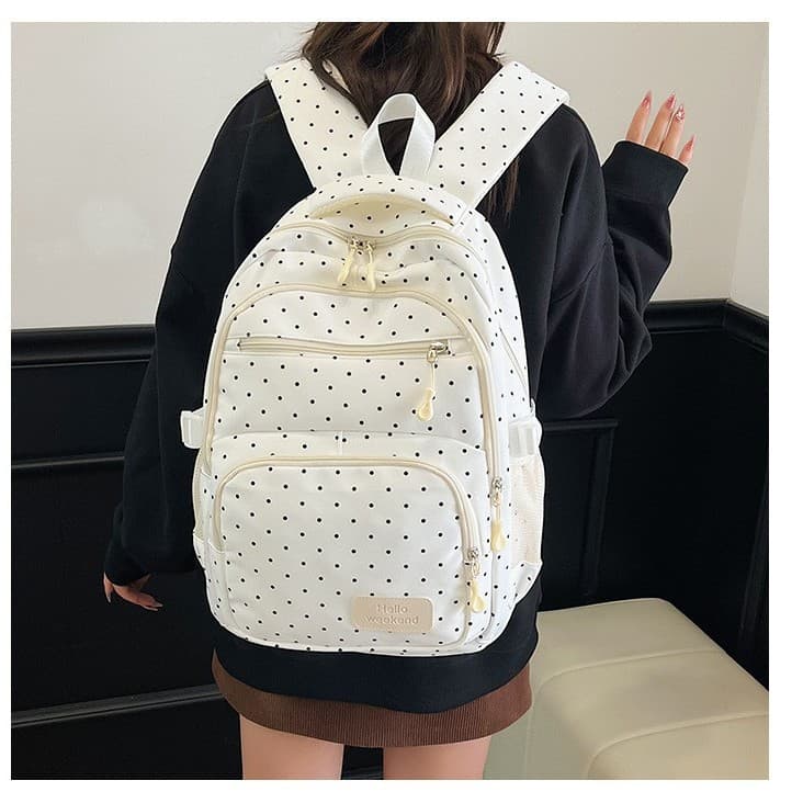 Korean version of polka-dot ins girl backpack for junior and high school students with good looks, fresh, large capacity, gentle, sweet and cool