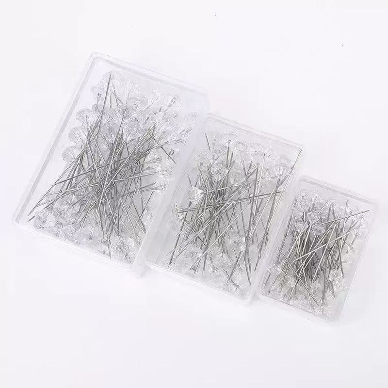 Diamond needles, large pins, fixing pins, and butterfly pins are used for DIY crafts, including patchwork and bouquet positioning.