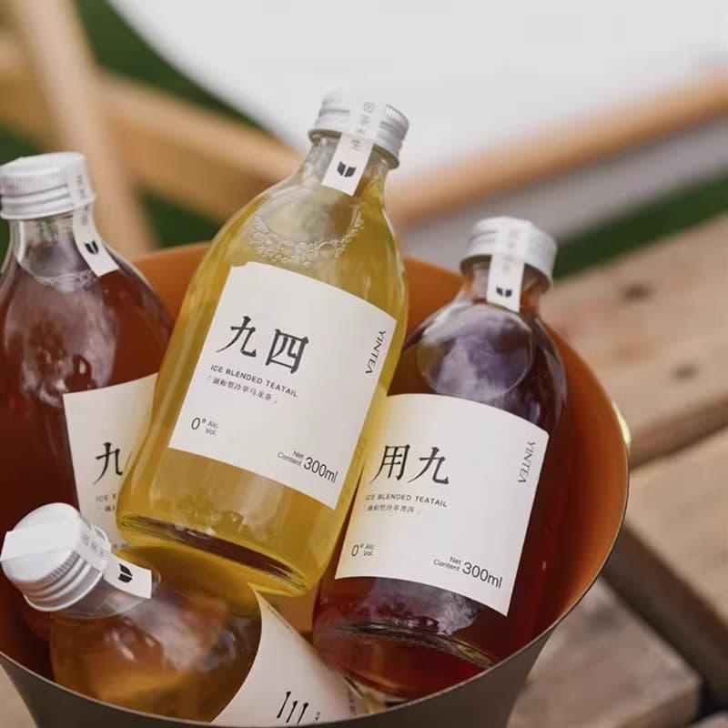 Internet celebrity Qiyi mineral water glass bottle mamacha same style ice drop cold brew tea bottle 500ml beverage bottle juice bottle