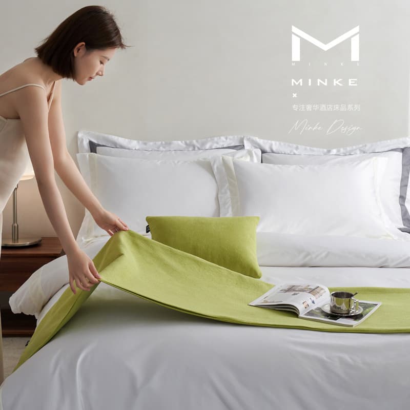 Hotel guest rooms, bed runners, bed flags, throw pillows, lumbar pillows with pillow cores, soft furnishings, sample rooms, bed sheets, and blankets.