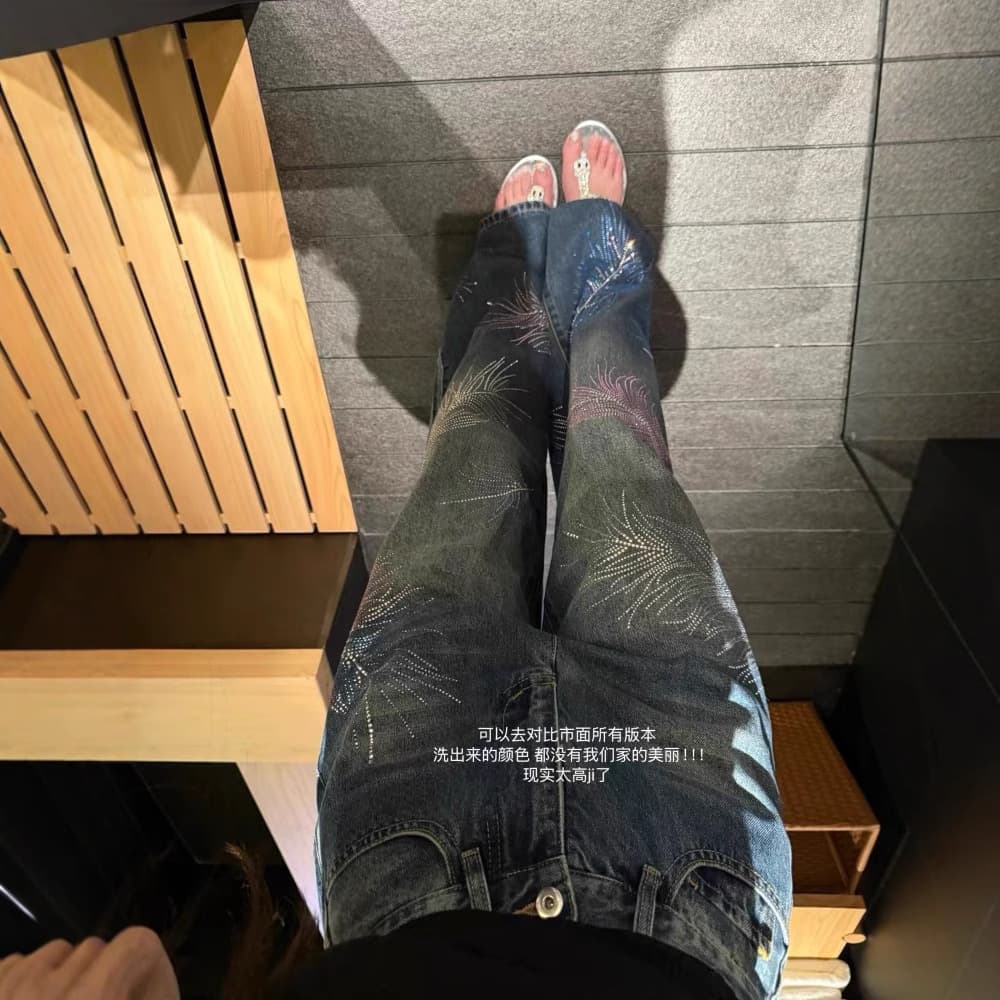 Shenzhen Nanyou high-end heavy industry feather perm jeans high waist trousers