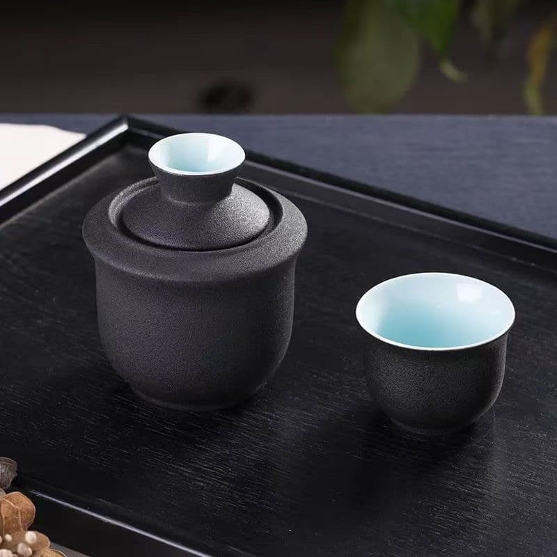 Chinese black pottery Lu Bao wine warmer set, traditional home heating vessel for spirits.
