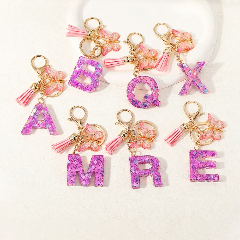New light purple mixed color glitter English letter resin key pendant fashion simple butterfly tassel bag pendant