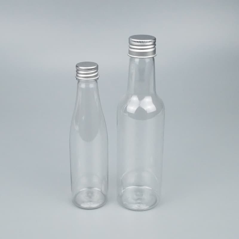 Factory direct supply PET transparent wine bottle aluminum cap plastic bottle Beverage wine bottle candy packaging bottle