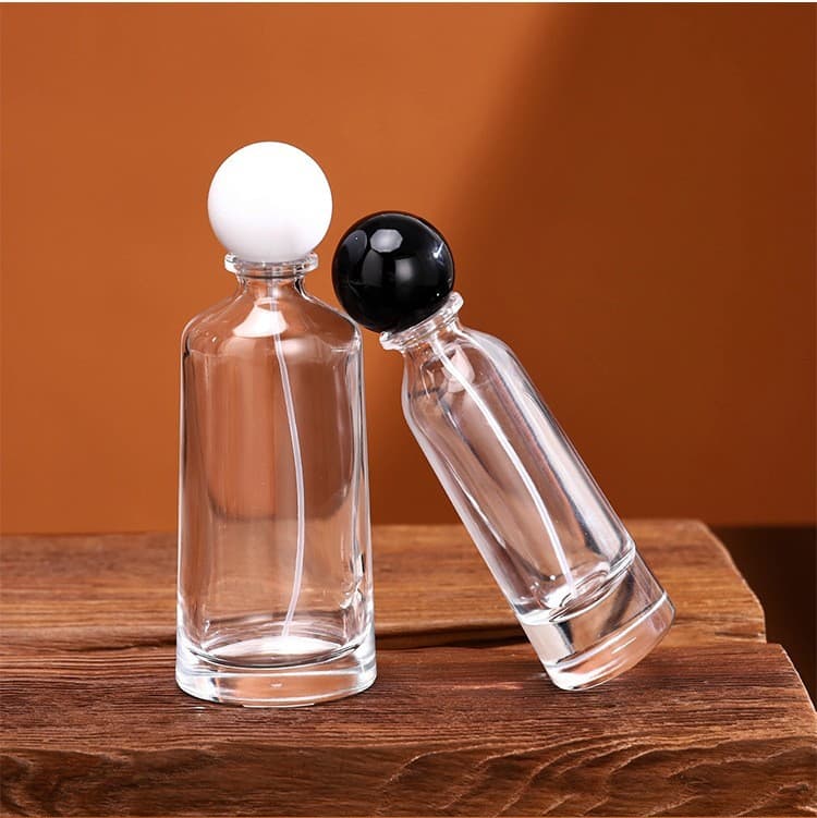 Factory Wholesale Creative Perfume Glass Bottle 15mm Neck Round Ball Cap Refillable Bottle 50ml 100ml Empty Bottle