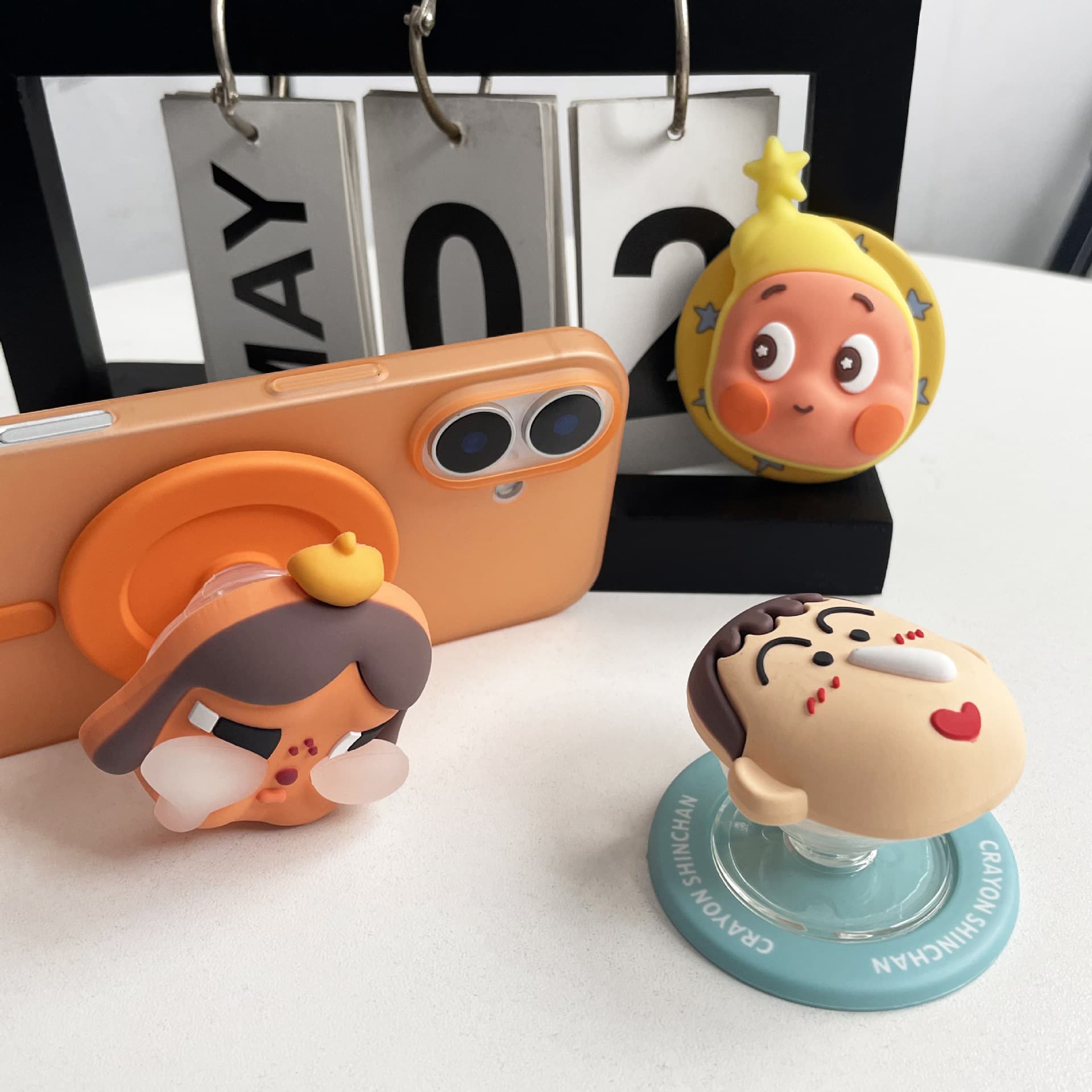 Korean-style cute cartoon crying baby mix-and-match MagSafe magnetic airbag phone stand desktop drama-watching accessory versatile