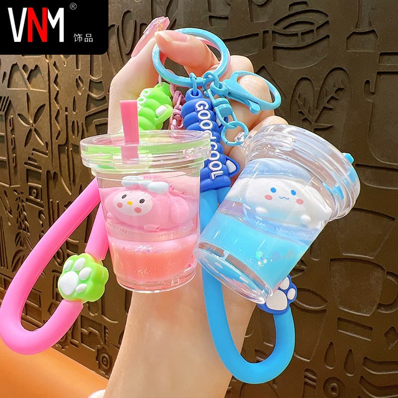 Creative oiled little doll milk tea cup keychain exquisite and cute liquid quicksand pendant bag accessories small gifts