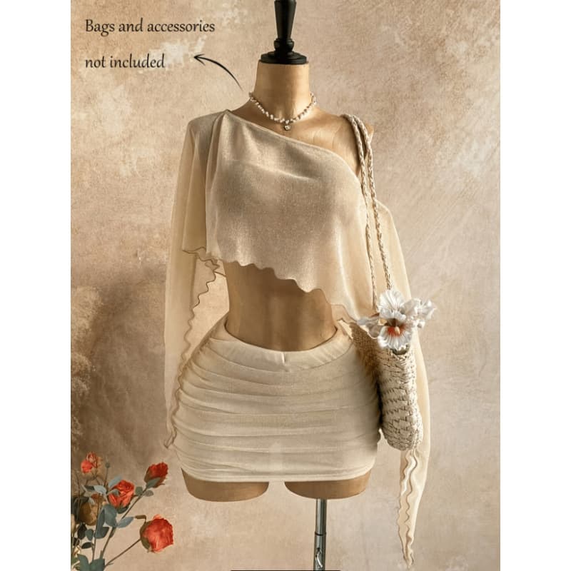 Women's summer sexy vacation see-through asymmetrical sloping shoulder long-sleeved top with solid color skirt does not include accessories