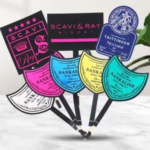 Manufacturer produces luminous labels, luminous bottle stickers, electronic luminous wine labels, EL luminous wine labels, and glow-in-the-dark labels.