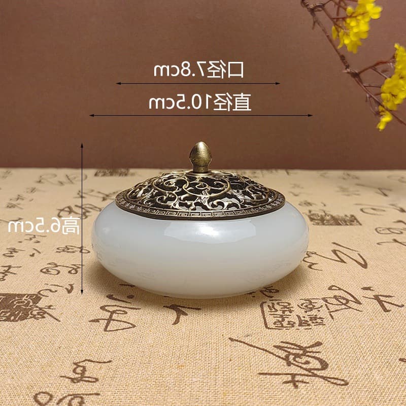 Sandalwood burner for tea ceremony and Zen ambiance, also used as an air purifier with agarwood coil incense and glass ornament.