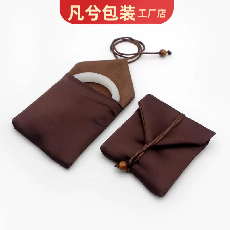Drawstring bags for jewelry, accessories, bracelets, and collectibles, available in velvet, brocade, or cloth materials.