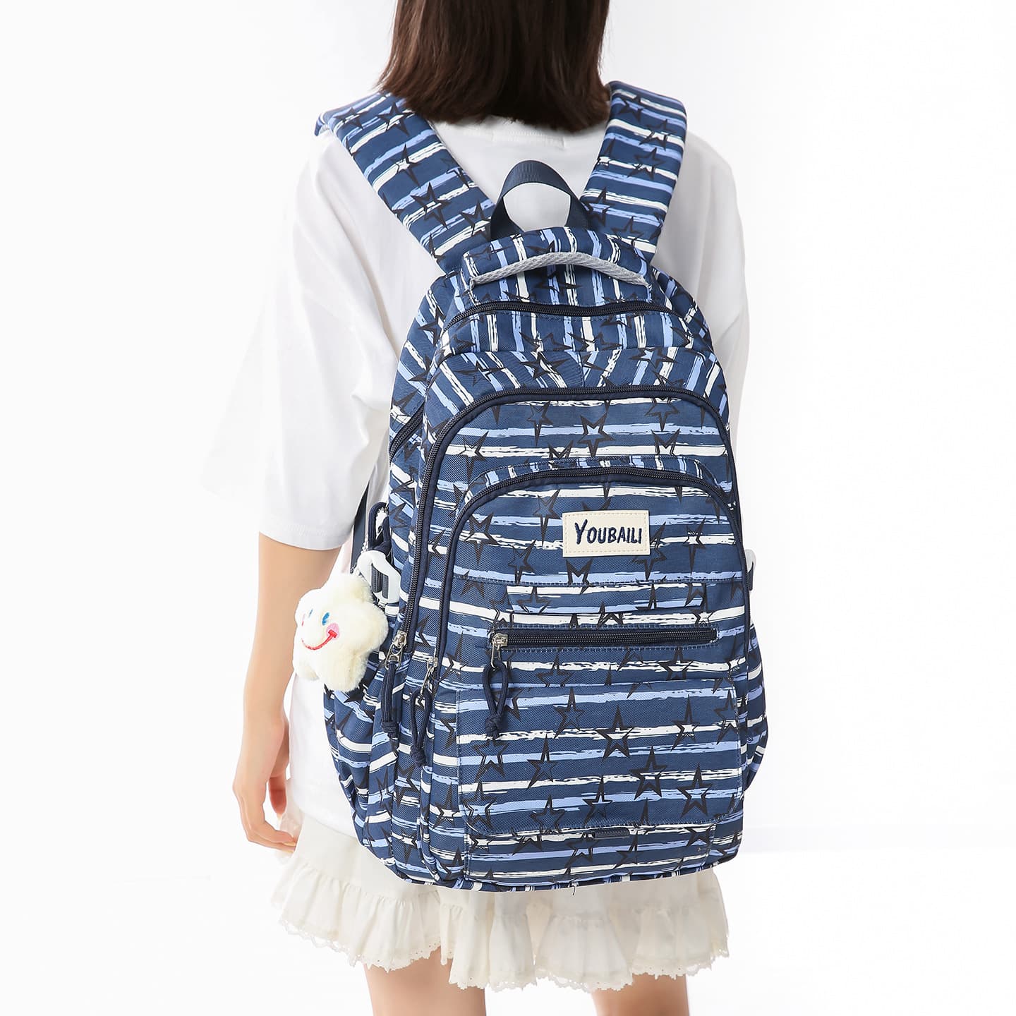 New middle school, high school and elementary school students' schoolbags, men's spine protectors, large-capacity full-print star backpacks, leisure travel backpacks