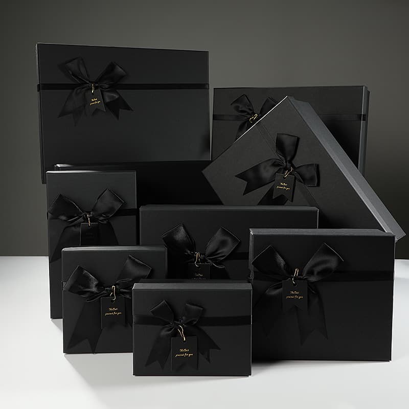 Elegant black bow-shaped gift box for birthday gifts, cosmetics, and other small gifts. Wholesale.