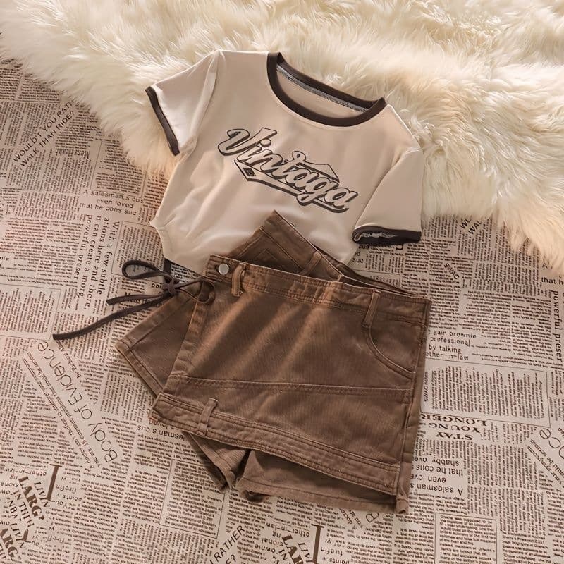 Girls suit summer 2026 new strappy short-sleeved irregular shorts two-piece set Western fashion hit the street
