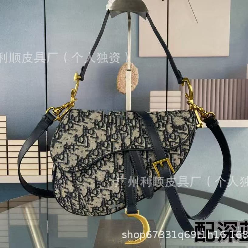 Cross-border Guangzhou High-quality D-shaped Saddle Bag Monogram Embroidery Genuine Leather Palm Texture Matte Flap Shoulder Bag for Women
