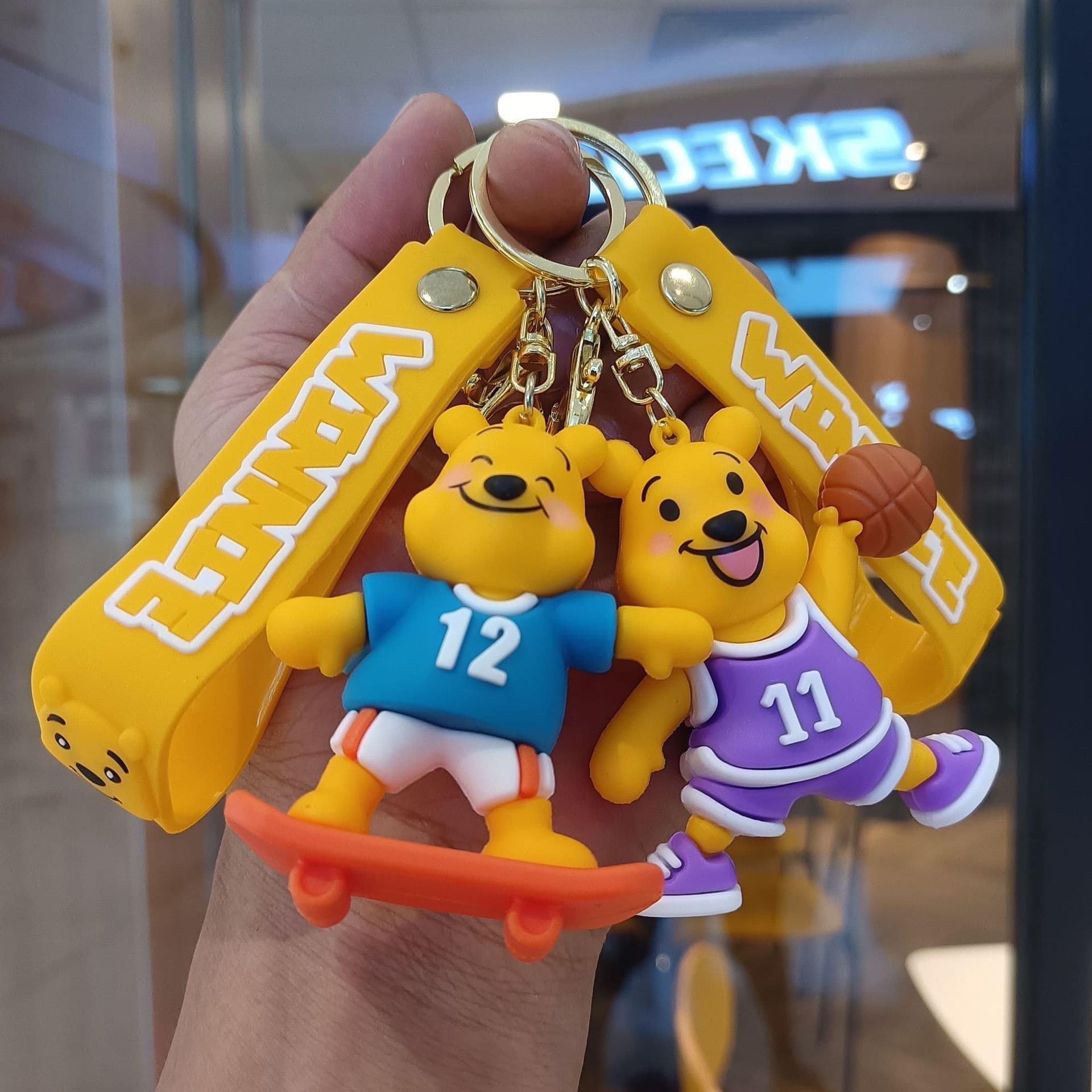 Internet celebrity sports Winnie the Pooh key chain cartoon fitness bear doll pendant bag key chain claw machine gift