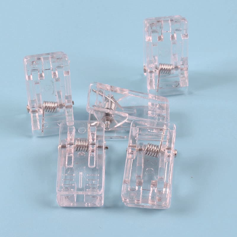Plastic chest card holders, ID badge clips, transparent spring clips for company badges.