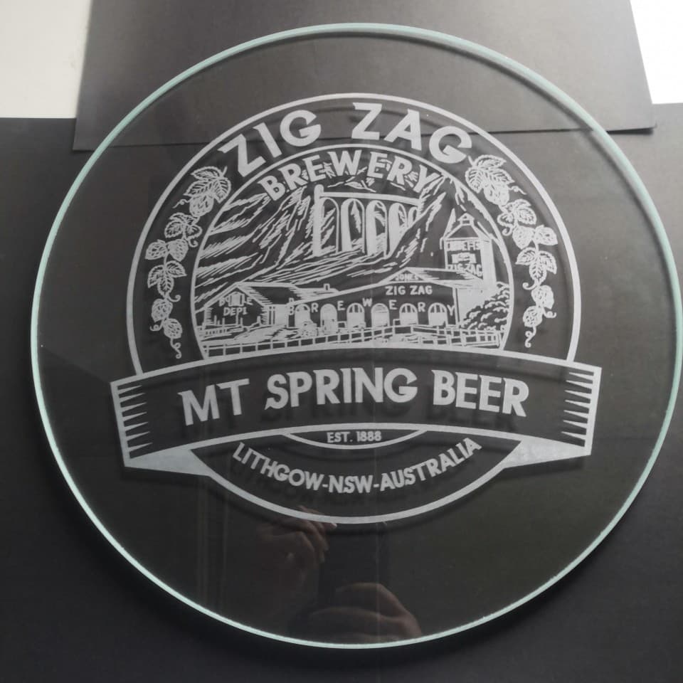 Tempered glass laser engraving and cutting services.