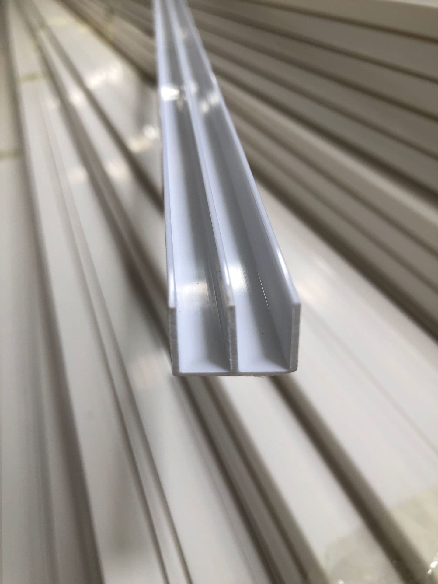 PVC glass cabinet door slide rails, display case slide tracks, glass sliding door tracks, black and white herringbone grooves