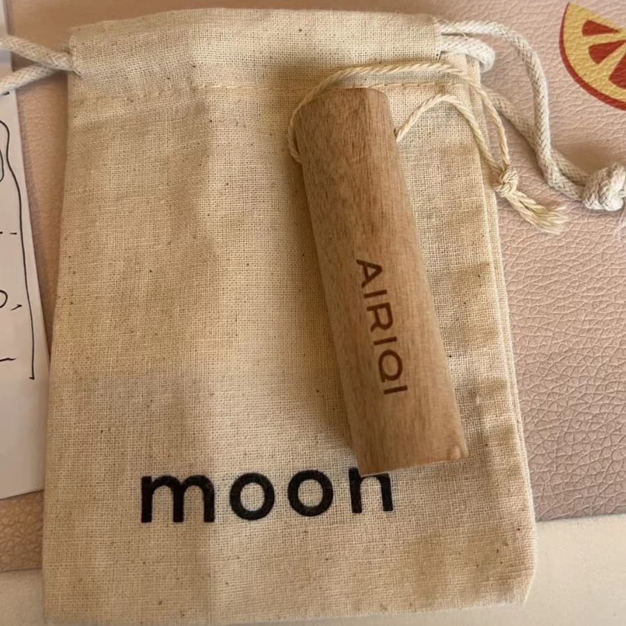 Natural beige pure cotton drawstring bag for gifts, jewelry, cork, essential oil sample packs, and storage.