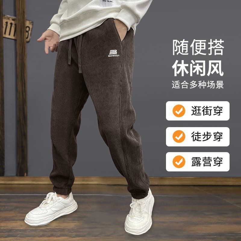 Men's autumn and winter fleece-lined warm casual sports pants, classic and versatile corduroy loose-fitting jogger pants, for export and cross-border trade.