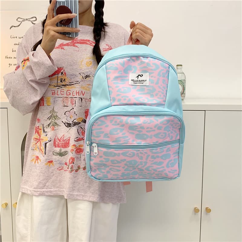Korean high-looking leopard print schoolbag female middle school and high school college student campus backpack casual lightweight large-capacity backpack