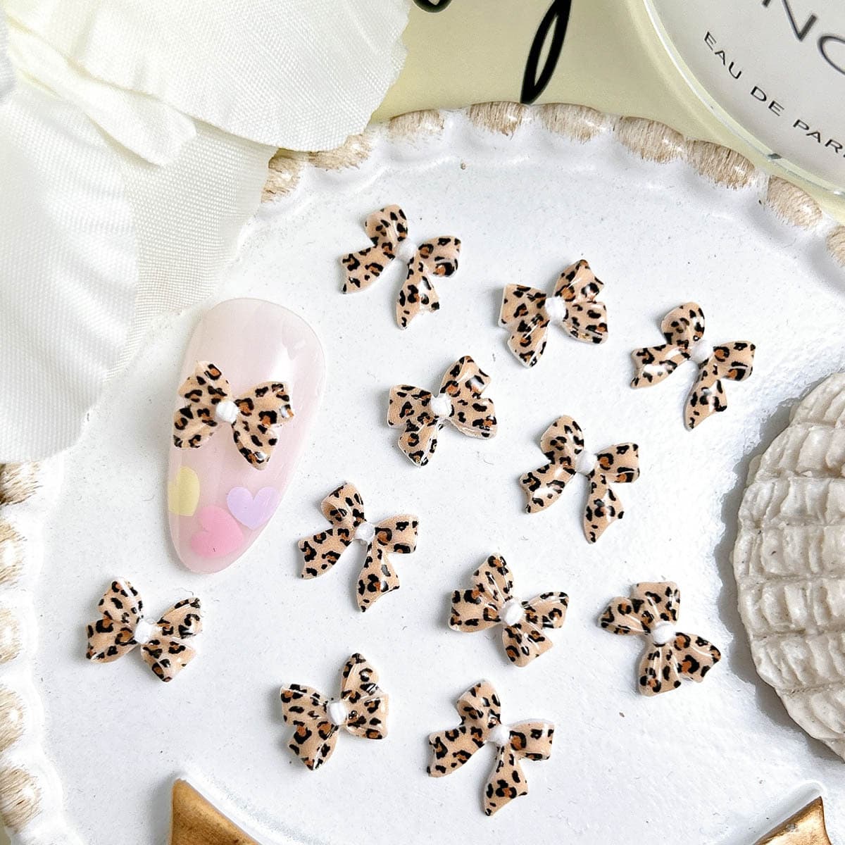 Douyin autumn and winter Maillard new leopard print bow tie resin manicure jewelry nail accessories wholesale