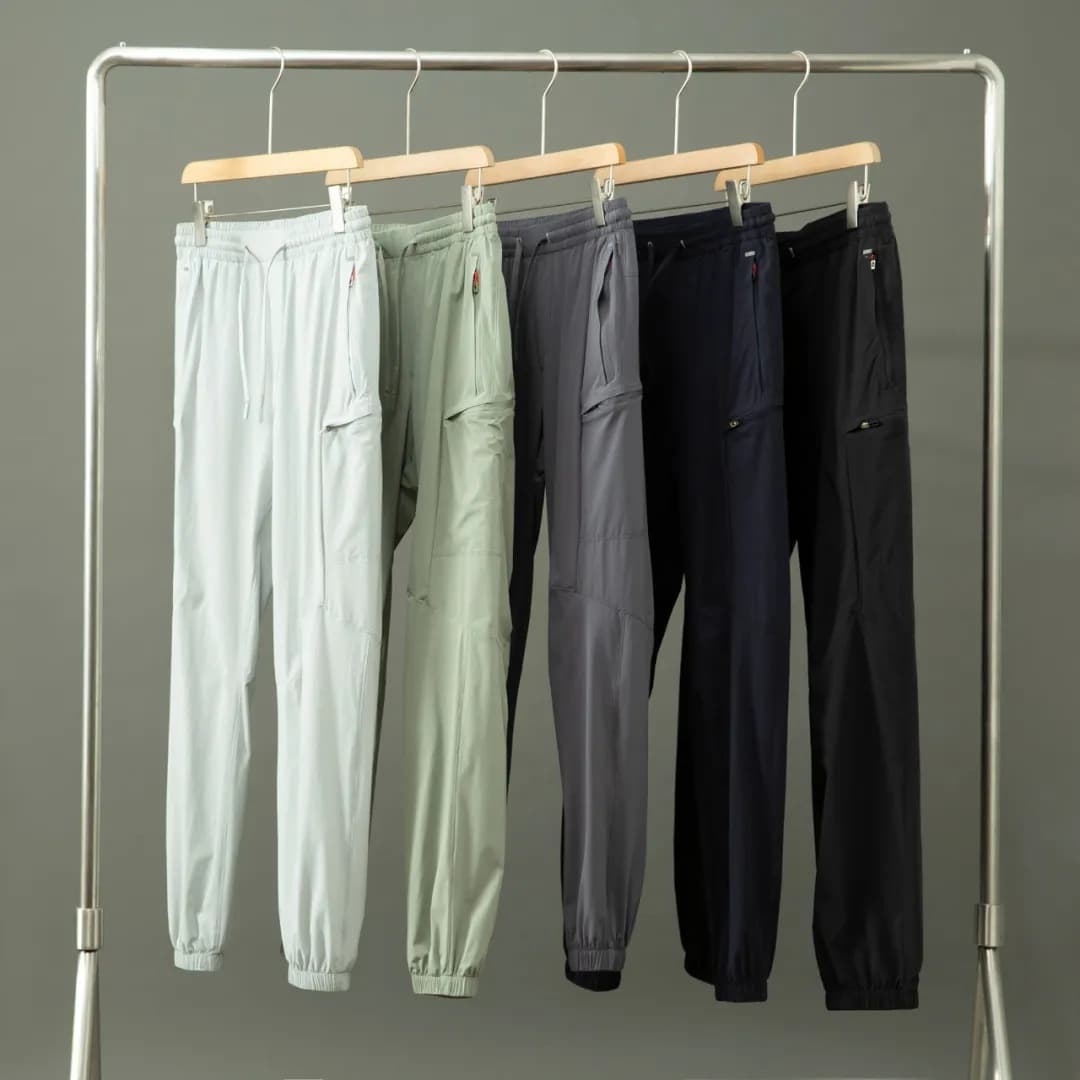 Men's summer lightweight three-dimensional tailoring casual sports breathable and comfortable perforated thin quick-drying elastic cuffed trousers