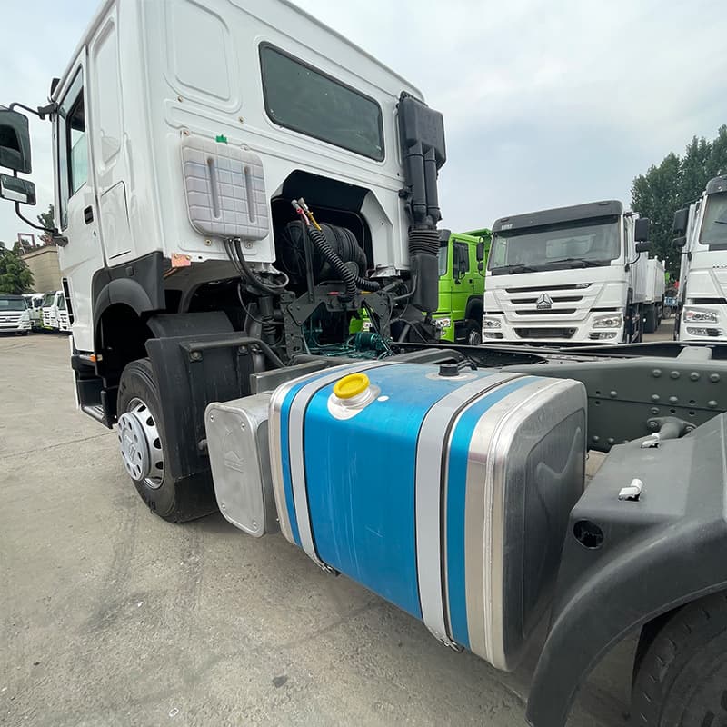 Rear 8-wheel Howo tractor head for sale, dual-drive freight truck head, 375HP container transport tractor