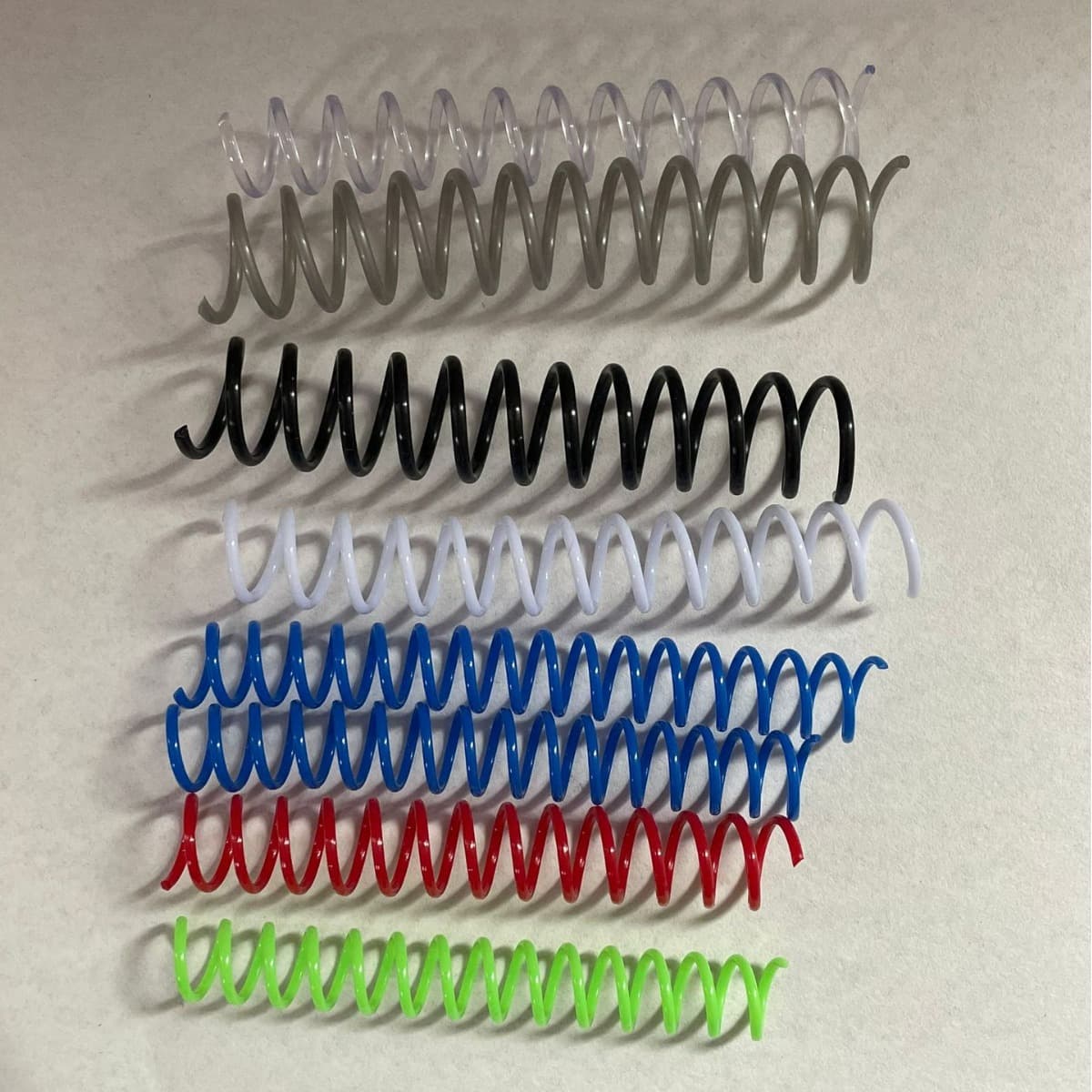 Plastic Single Coils, Binding Spiral Coils, Plastic Single-Loop Rings for Books and Contracts