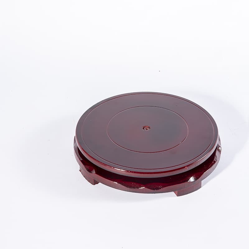 Rotatable faux solid wood round base for flower pots, fish tanks, handicrafts, vases, wine bottles, and other solid wood ornaments.