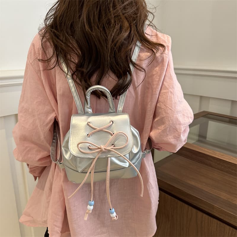 Ballet-style bow backpack for women, 2024 new style, trendy small handbag for shopping and travel.