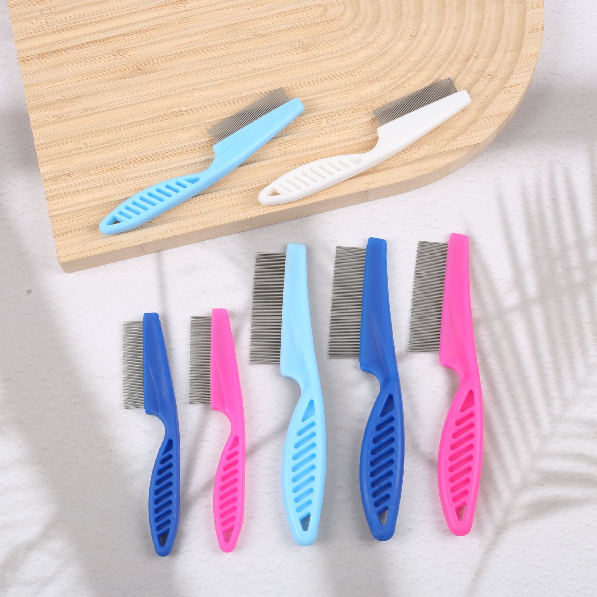 Stainless steel pet comb manufacturer, cat and dog hair removal and flea comb, hair removal and cleaning comb, pet-specific comb.