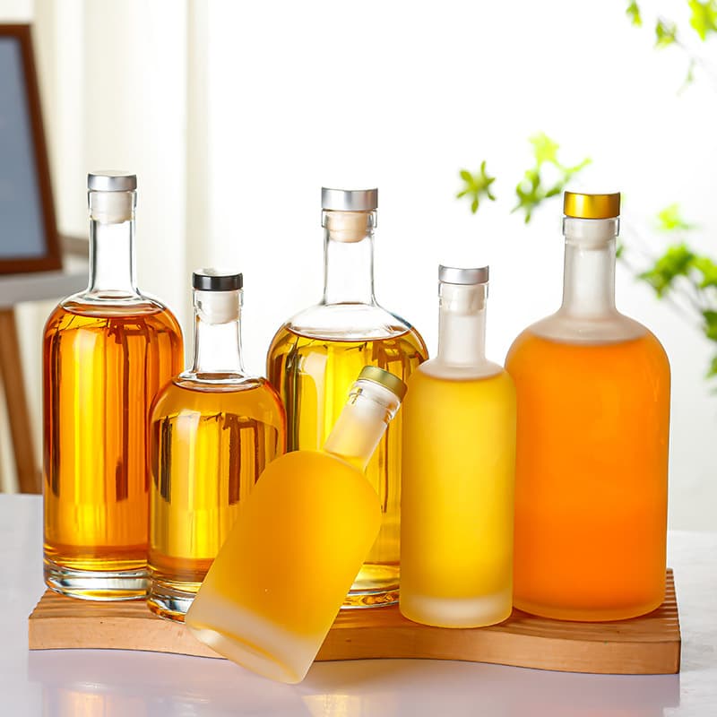Factory direct stock of vodka bottles, fruit wine bottles, flat-mouth bottles, transparent frosted glass, thickened 1000ml.