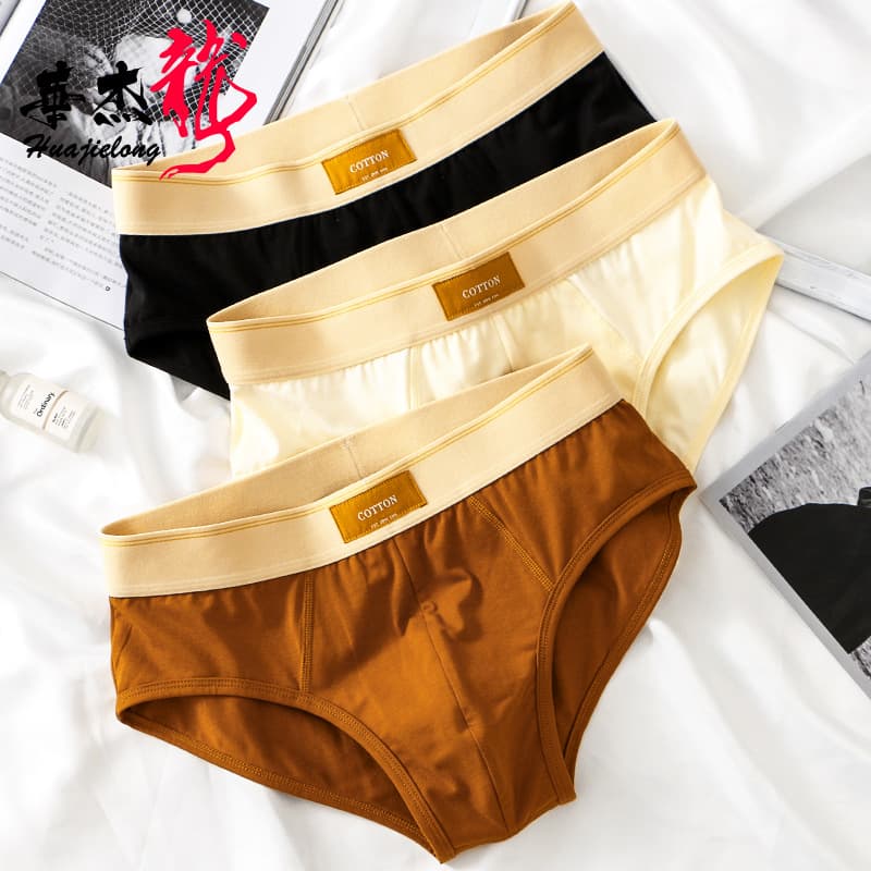 New Huajielong solid color men's briefs, loose, breathable, cotton, trendy, large size, drop shipping available.