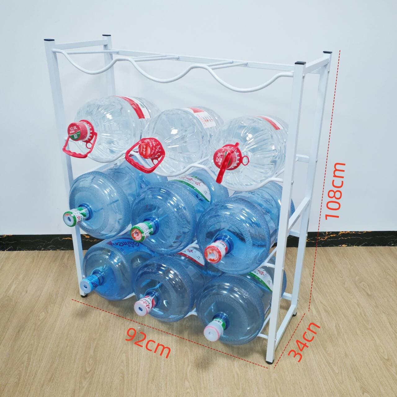 Multi-barrel display and storage racks for supermarkets and convenience stores, 12 to 19 liters, with curved design to prevent damage to the barrels.