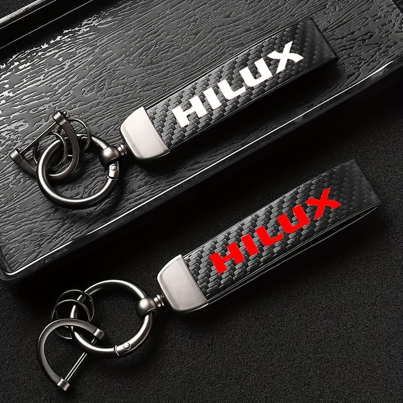 Suitable for Toyota HILUX Prado model keychain carbon fiber texture artificial leather 360-degree rotation