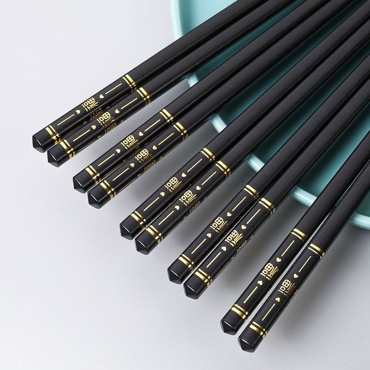 PET alloy chopsticks, household use, non-slip, mildew resistant, black with gold foil "Fu" character, 24cm, 10 pairs per pack, wholesale available.