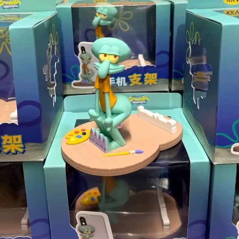 Cute and creative Squidward mobile phone desktop drama office ornaments violent lazy Squidward mobile phone holder