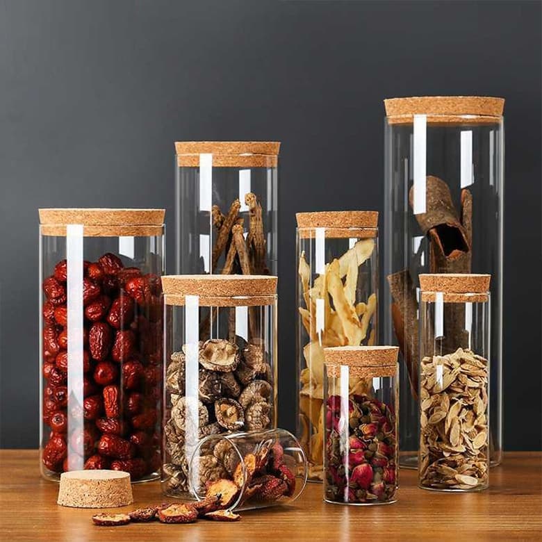 High borosilicate straight glass tea jars with cork lids, storage for grains and sealed packaging bottles.