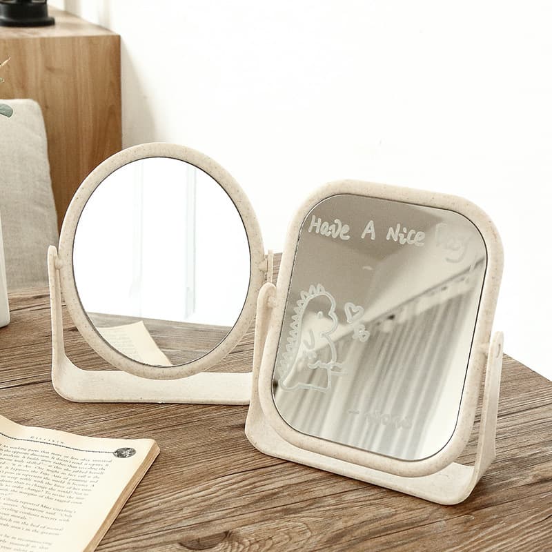 Desktop dual-sided makeup mirror with trendy design for girls, suitable for home and dormitory use.